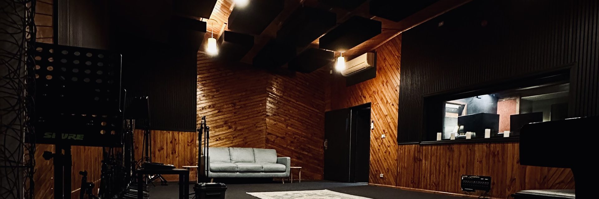 The timber-lined live room in Studio A, with the window through to the control room, at The Avenue Recording Studio, Cheltenham Melbourne