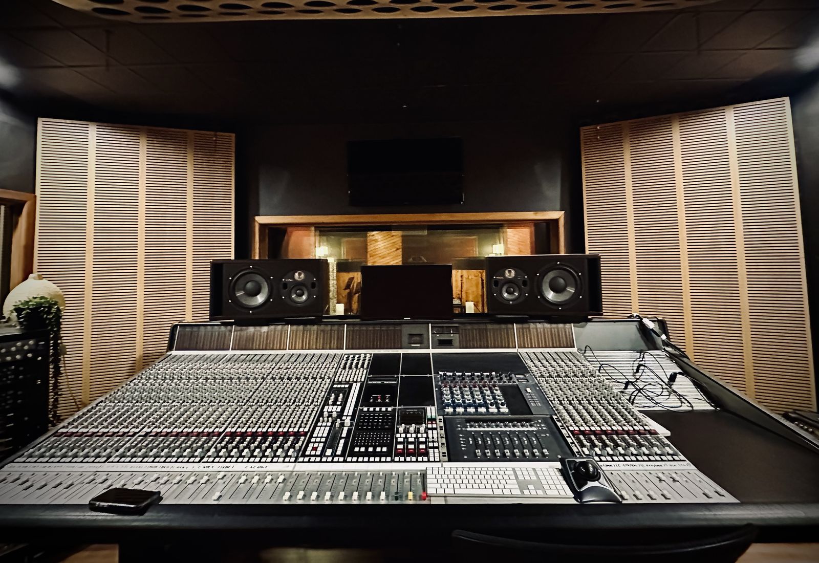 Studio A control room with the SSL 6000E console and main monitors, looking through to the live room at The Avenue Recording Studio, Bayside Melbourne