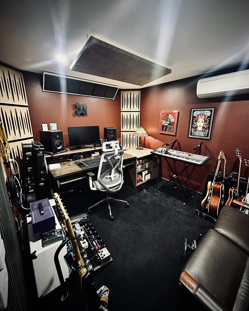 Studio D writing room with desk, monitors, keys and guitars at The Avenue Recording Studio, Cheltenham Melbourne