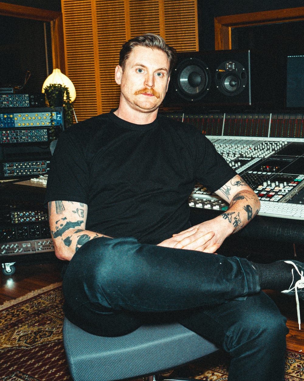 Tyson Fish, music producer, mix and mastering engineer, at the SSL console at The Avenue Recording Studio, Bayside Melbourne